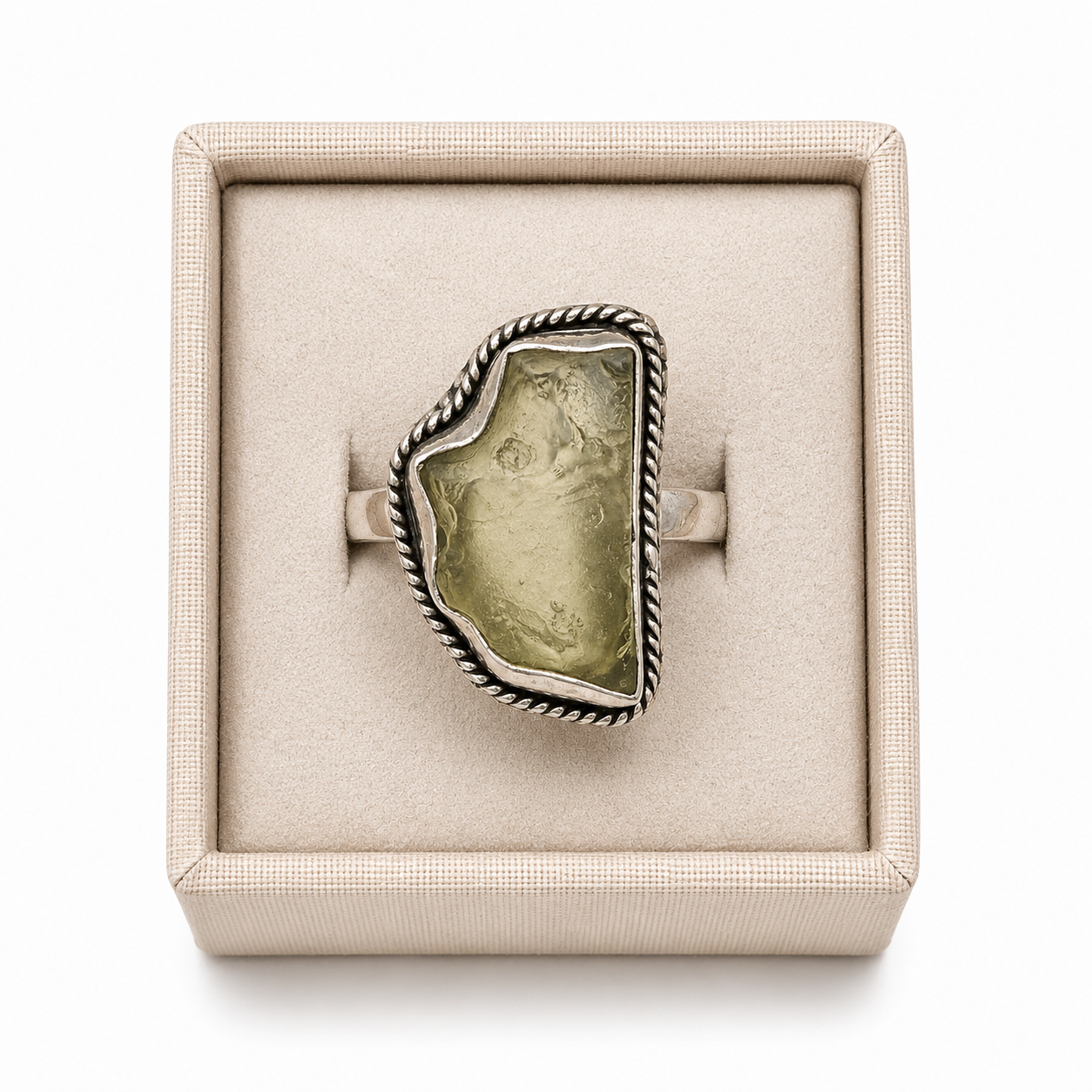 Sterling Silver Libyan Desert Glass Ring in a decorative box on a white background -Clover's Charm.