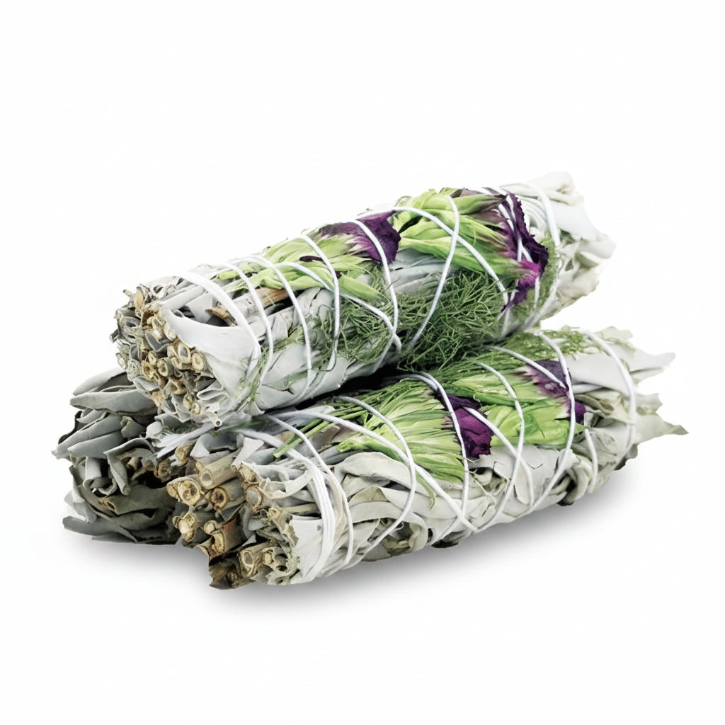 Three bundles of herbs tied with twine on a white background. - Clover's Charm