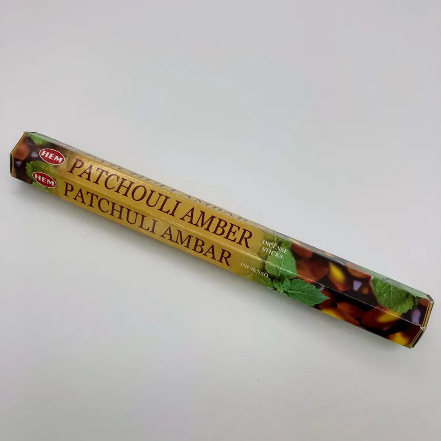 HEM patchouli amber scented incense on a white background. - Clover's Charm