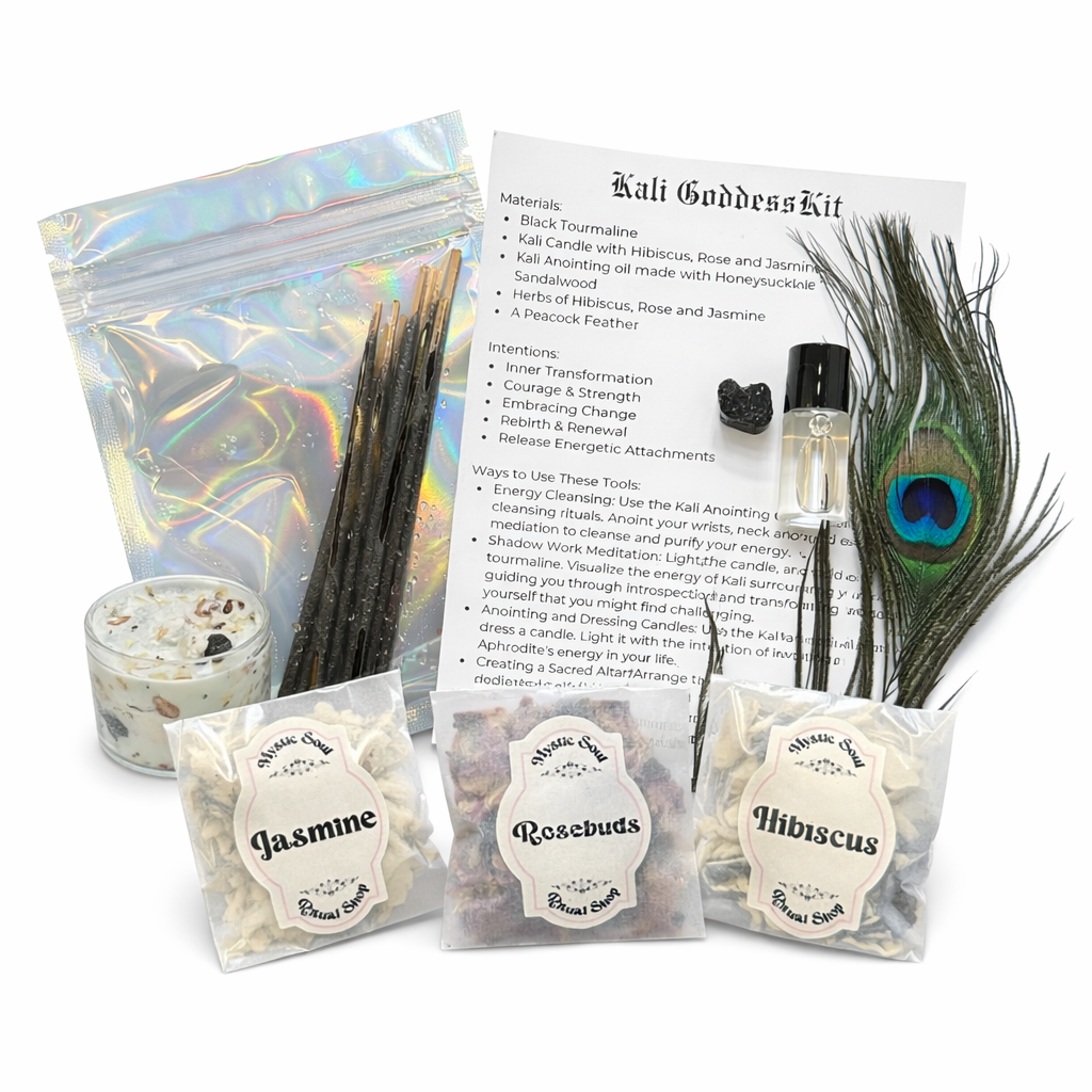 Kali Goddess Kit with candles, incense, and peacock feather on a white background