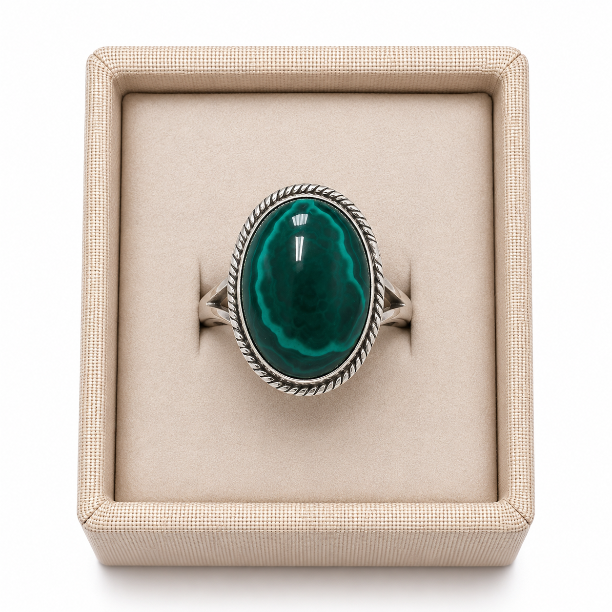 Sterling silver twist frame oval malachite ring in display box on a white background. - Clover's Charm