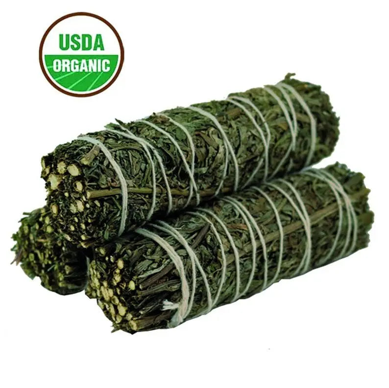 Two bundles of green herbs tied with twine on a white background, with an USDA Organic label.