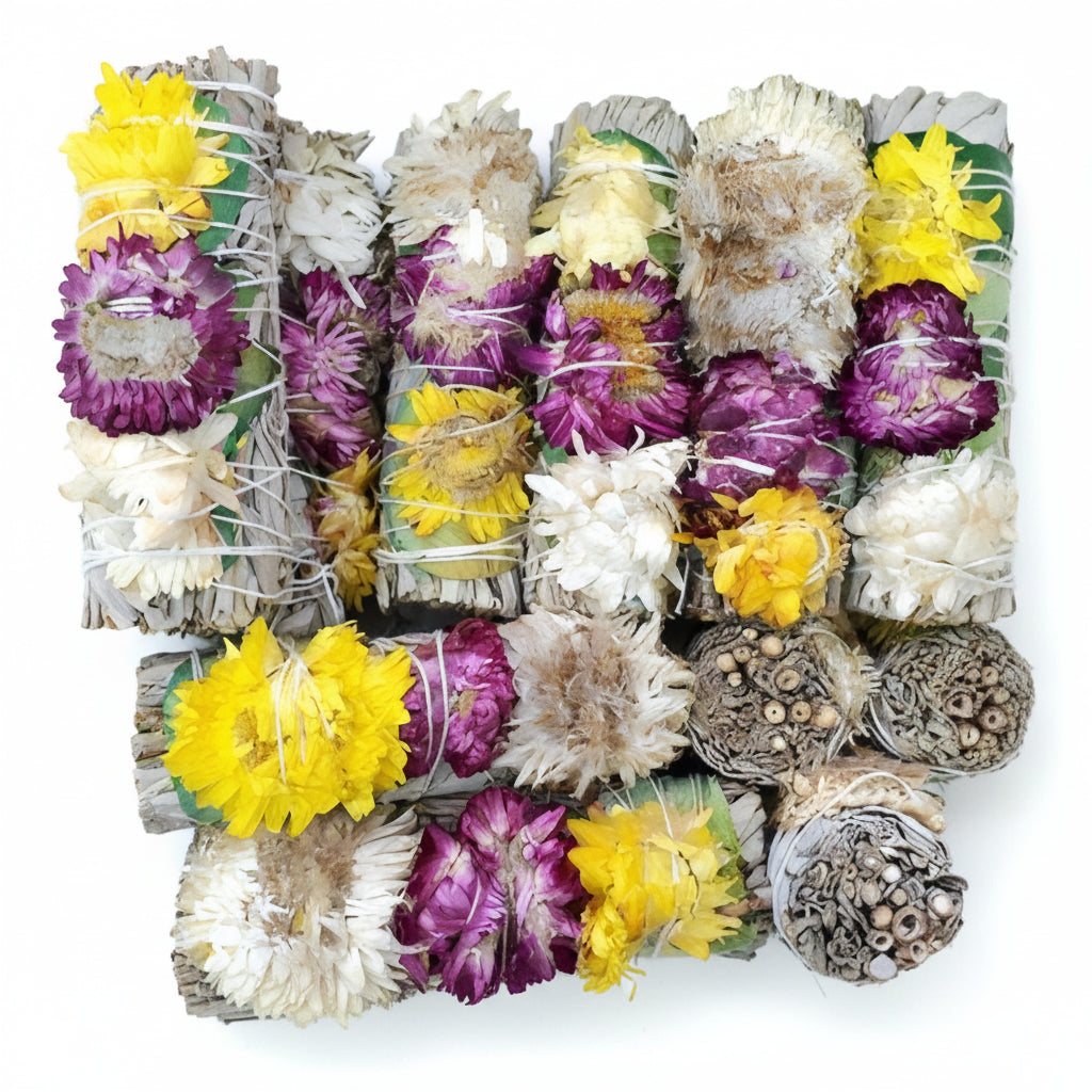 White sage smudge stick with green rose petals and three small flowers, ideal for cleansing and spiritual rituals. - Clover's Charm