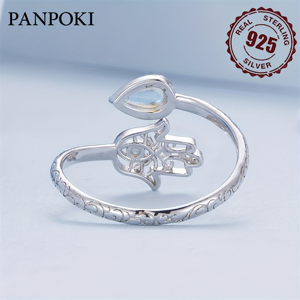 925 Sterling Silver Hamsa Wrap Ring – Zircon Palm Design Elegant Adjustable Ring on a soft blue background revealing the backside