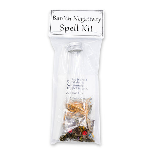 Spell kit packaging labeled 'Banish Negativity Spell Kit' on a white background