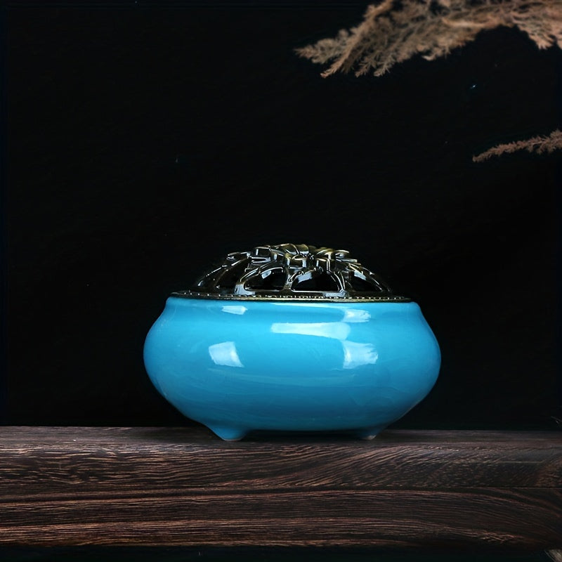 Icey Blue ceramic incense burner with decorative metal lid displayed on a wooden surface against a dark background for elegant home decor styling