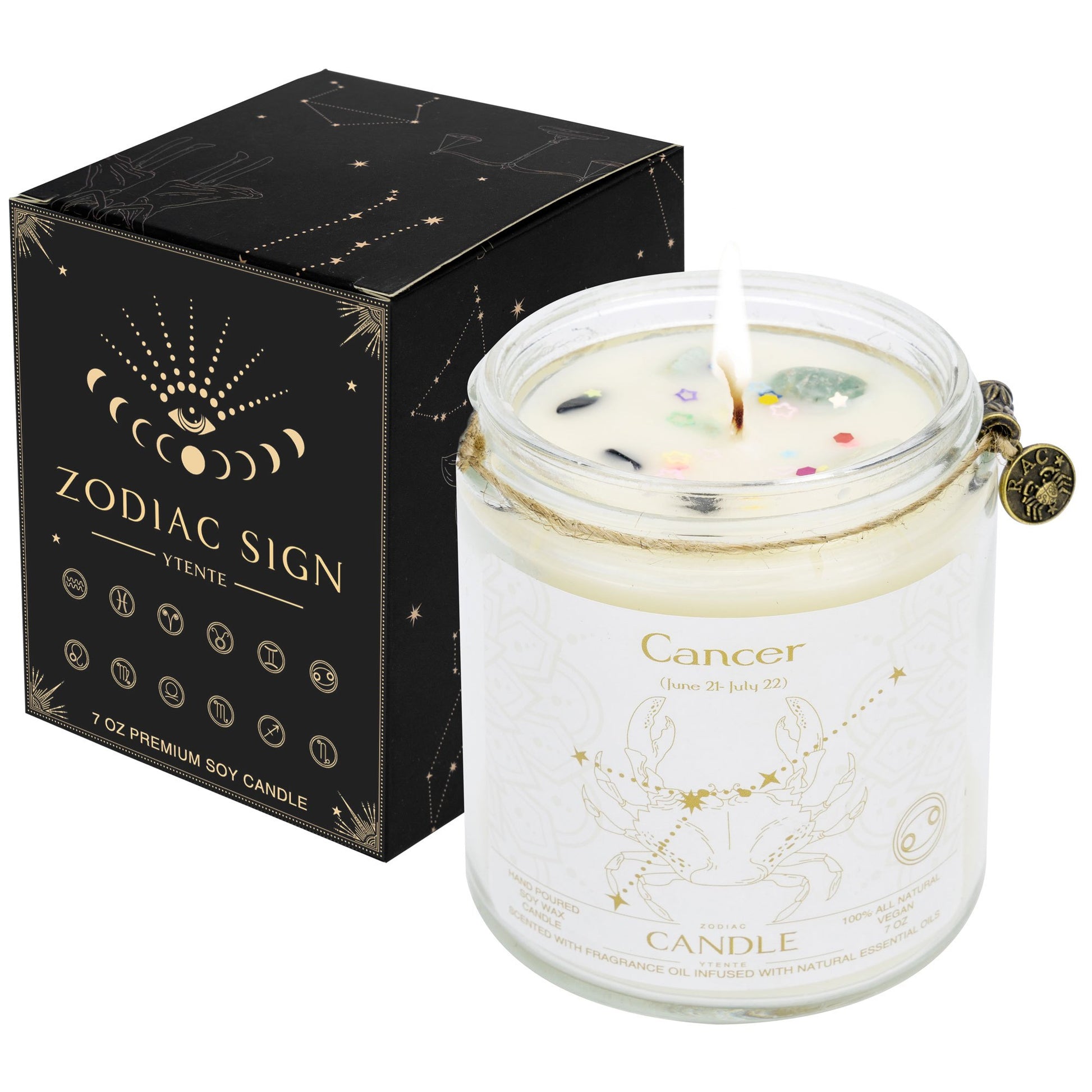 Lit Cancer zodiac candle in clear glass jar with lavender sprigs visible wax crystals and printed astrology design with size dimensions shown