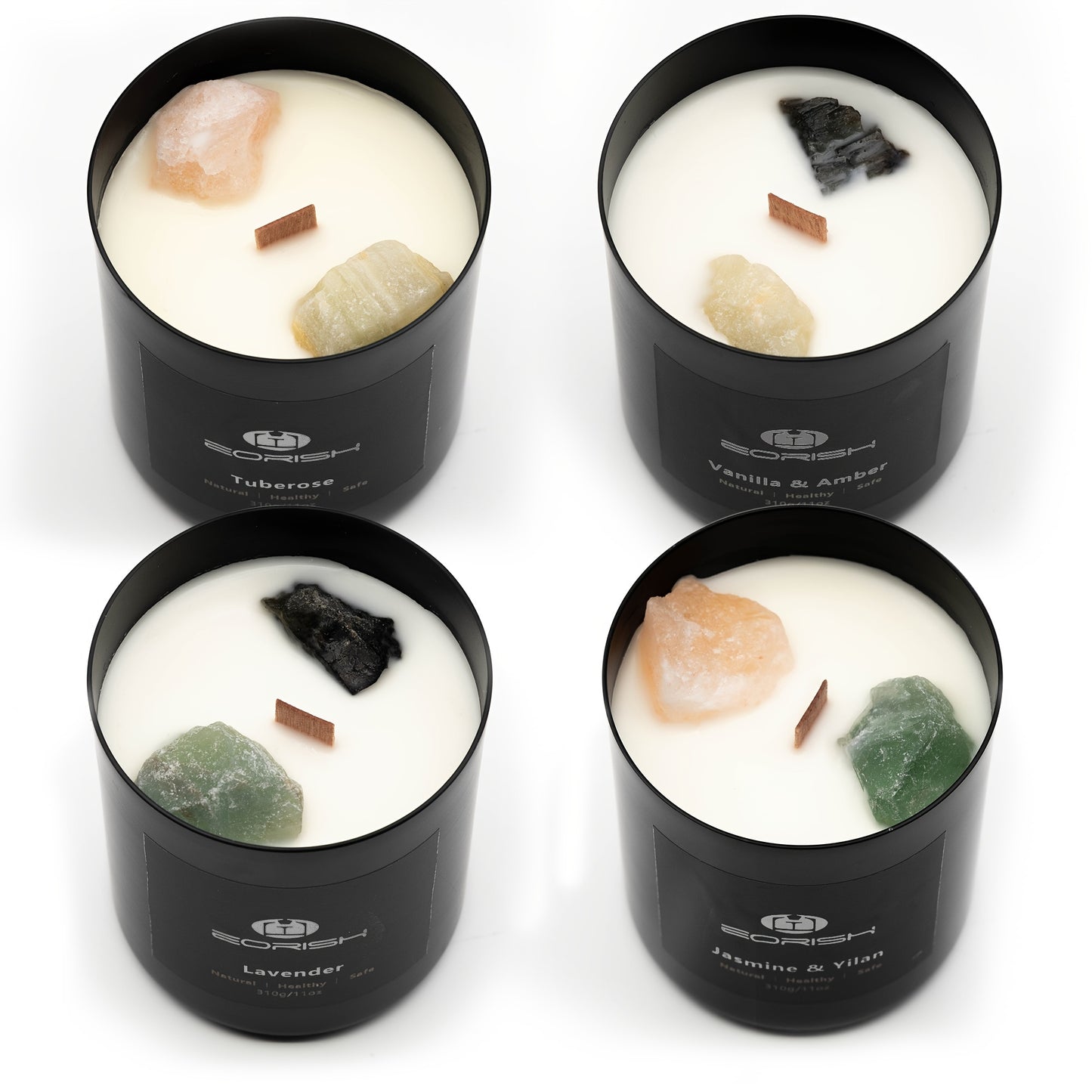Four black jar crystal candles with natural stone accents and wooden wicks displayed on a white background