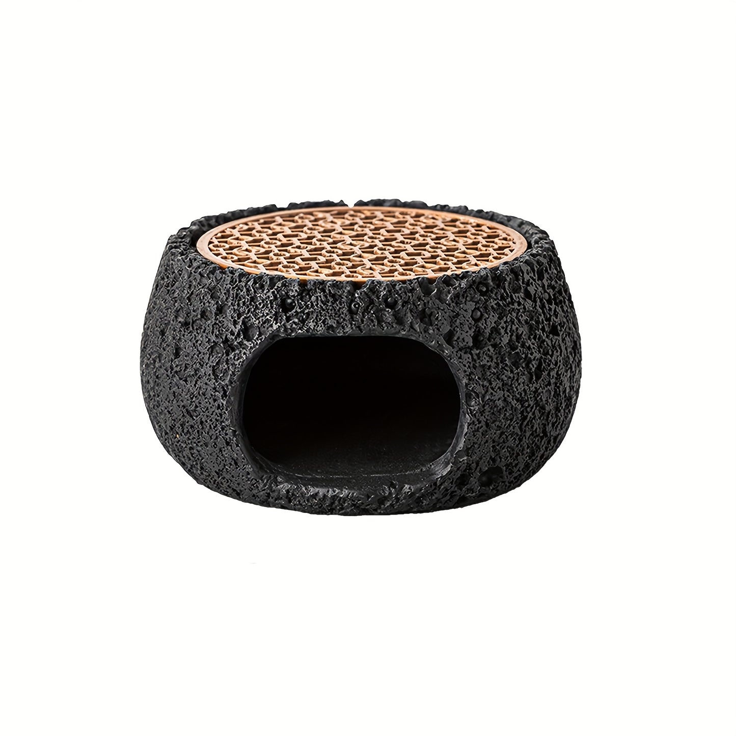 Black stone incense holder bowl with textured finish with a visible inside opening.
