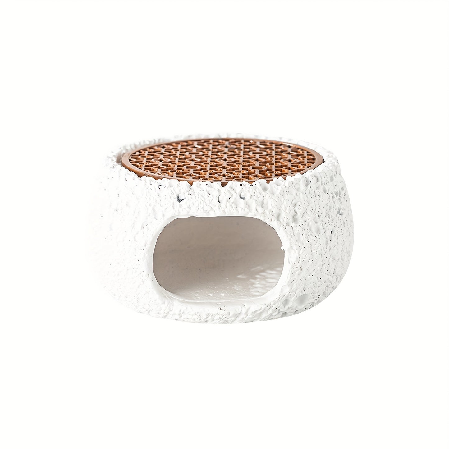 White stone incense holder bowl with textured finish with a visible inside opening.
