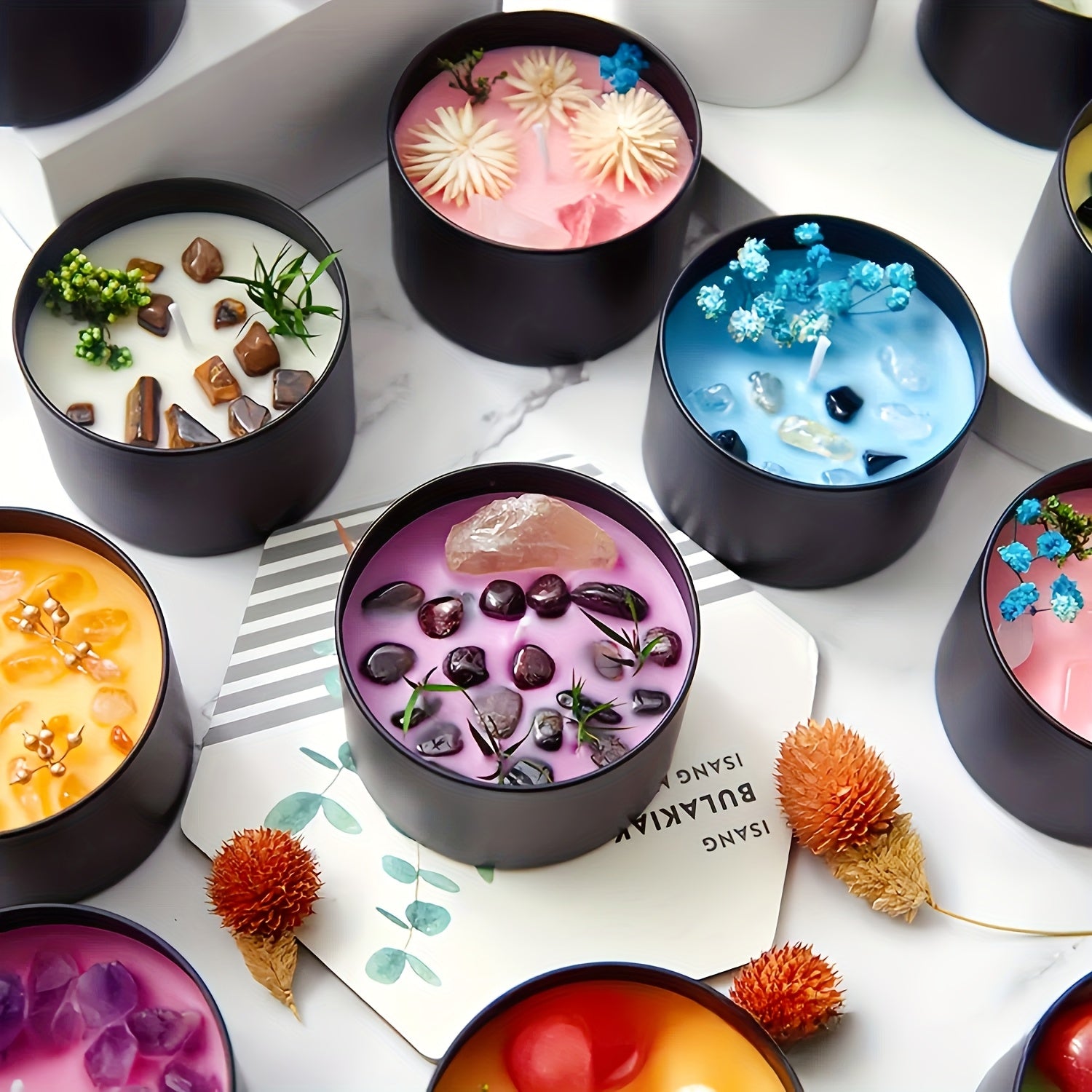 Crystal soy wax candle collection in black glass jars with wooden wicks, colorful wax blends, and natural stone accents for modern home decor zoomin