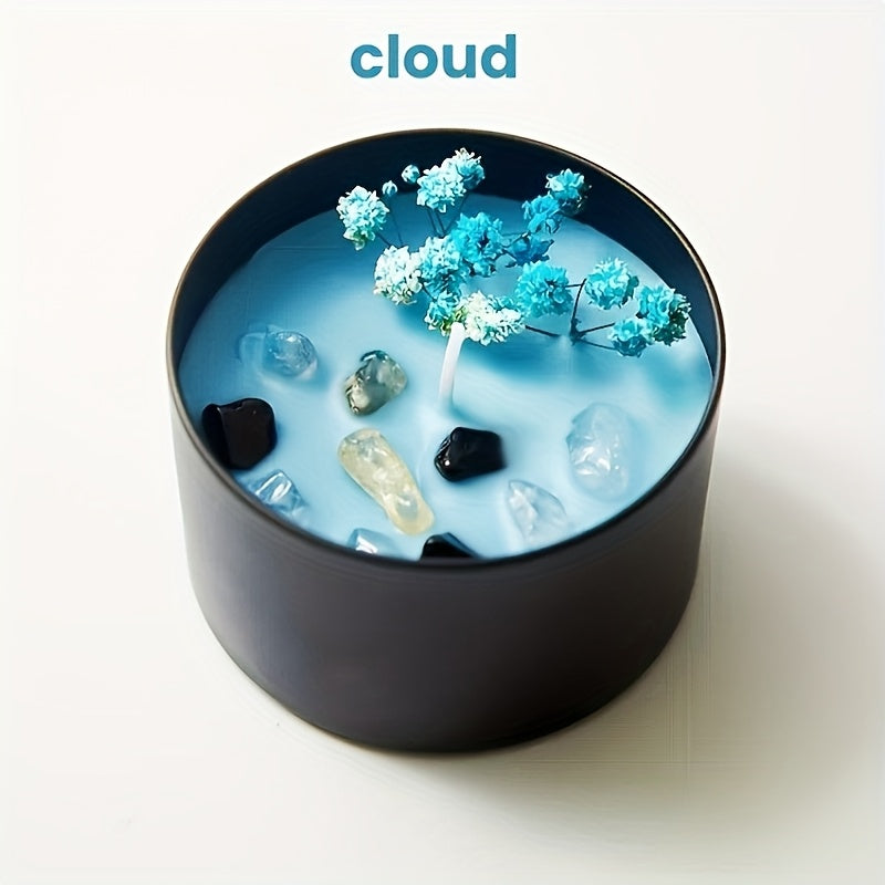 Blue Cloud crystal soy wax candle in a black glass jar with wooden wick, natural stone accents, and floral detail for modern home decor