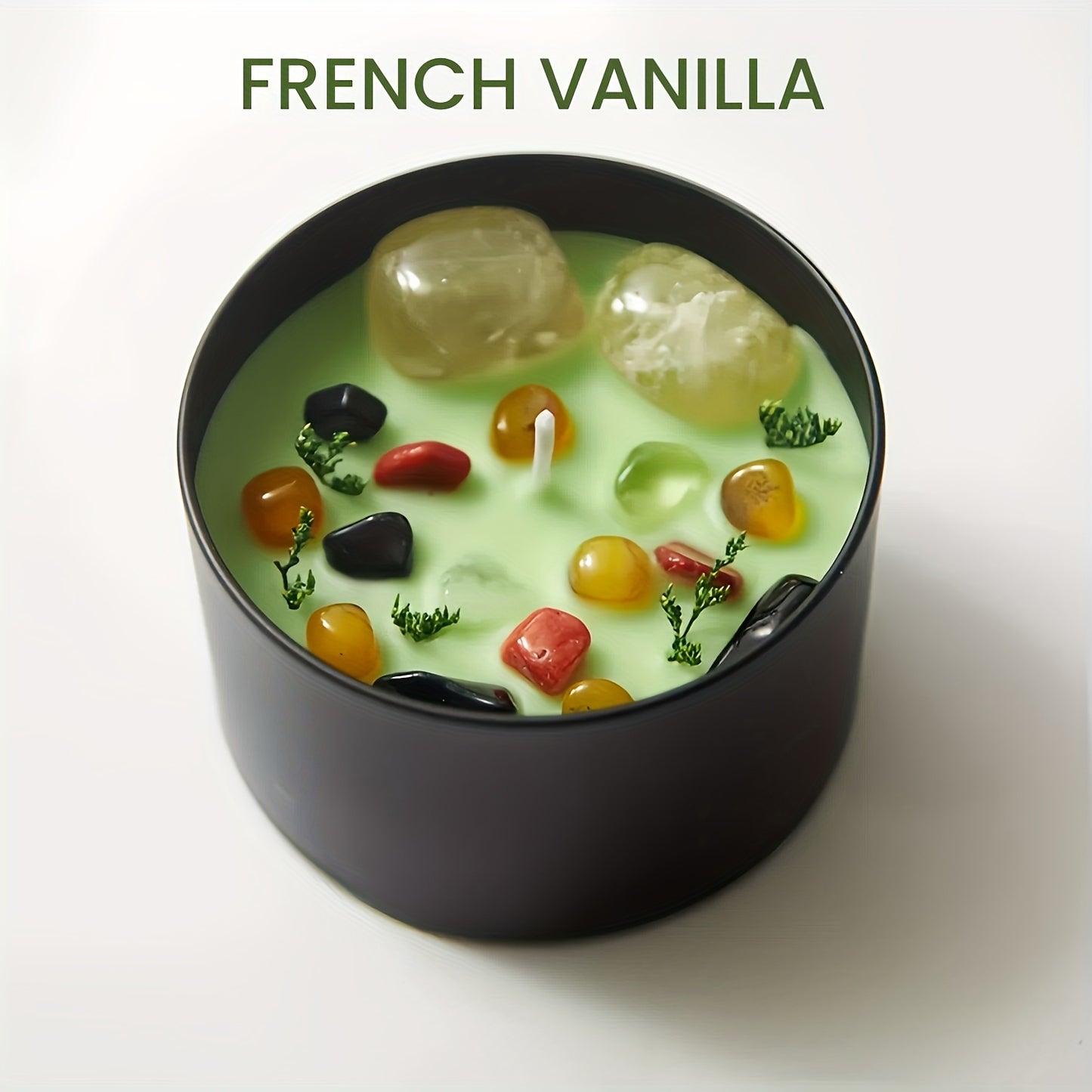 Green French Vanilla crystal soy wax candle in a black glass jar with wooden wick, natural stone accents, and floral detail for modern home decor
