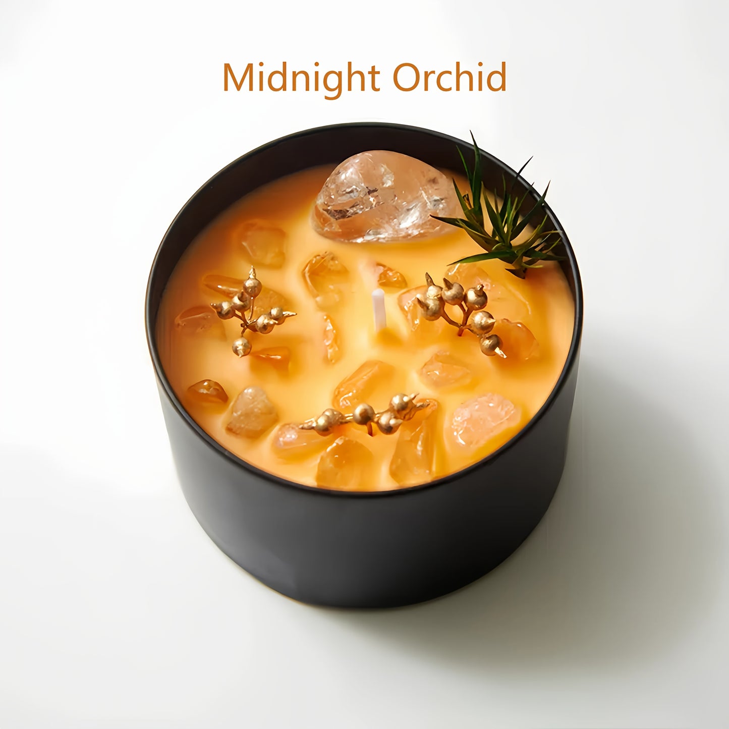 Orange Midnight Orchid crystal soy wax candle in a black glass jar with wooden wick, natural stone accents, and floral detail for modern home decor