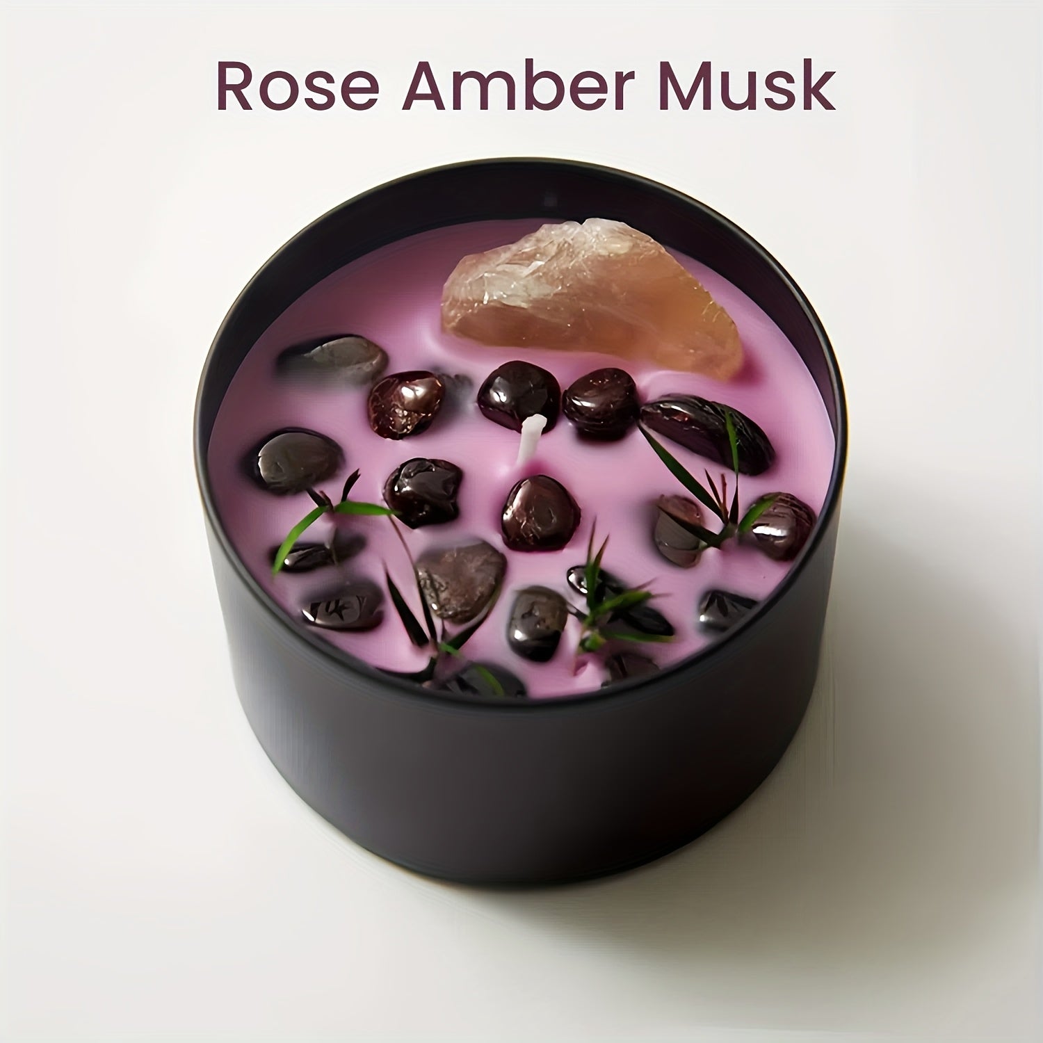 Purple Rose Amber musk crystal soy wax candle in a black glass jar with wooden wick, natural stone accents, and floral detail for modern home decor