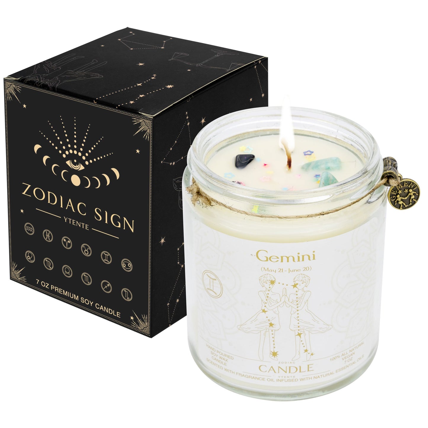 Lit Gemini zodiac candle in clear glass jar with lavender sprigs visible wax crystals and printed astrology design with size dimensions shown