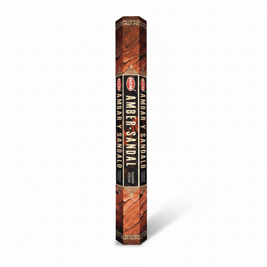 HEM incense scented as amber and sandalwood on a white background. - Clover's Charm