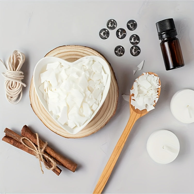 Heart-shaped bowl with white cream, cinnamon sticks, a bottle, and other items on a light gray background