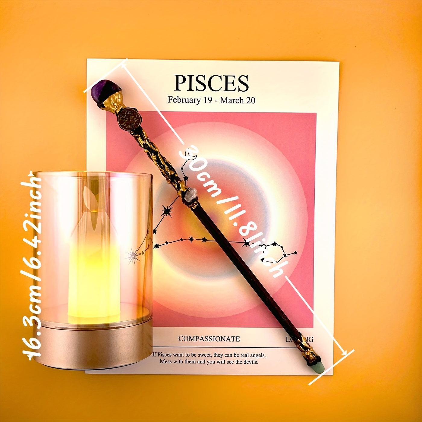 Pisces zodiac art print with constellation design displayed beside a glass candle holder and decorative astrology wand on a warm yellow background measurements displayed