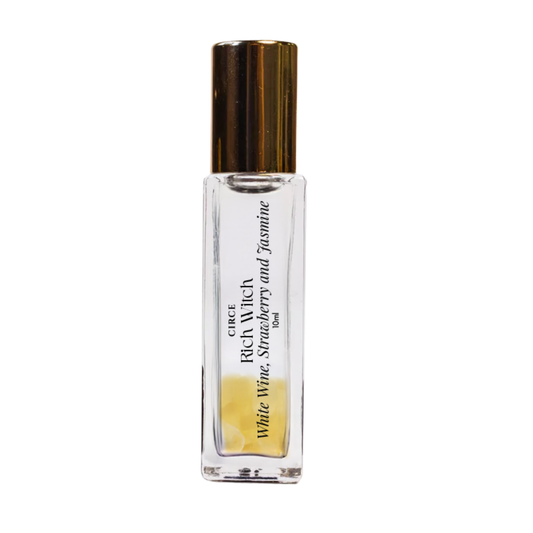 Rich Witch aromatherapy potion featuring a dark, mystical bottle with a rich, enchanting label and potion inside. -Clover's Charm