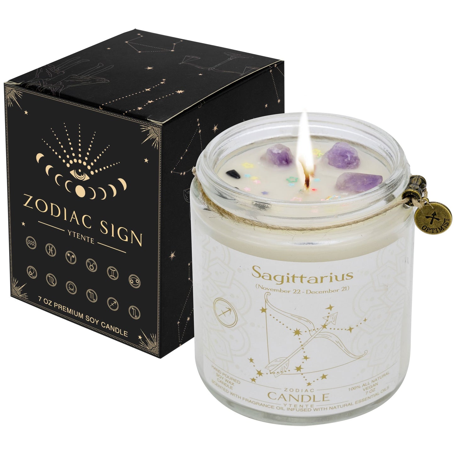 Lit Sagittarius zodiac candle in clear glass jar with lavender sprigs visible wax crystals and printed astrology design with size dimensions shown