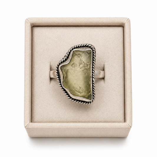 Sterling Silver Libyan Desert Glass Ring in a decorative box on a white background -Clover's Charm.