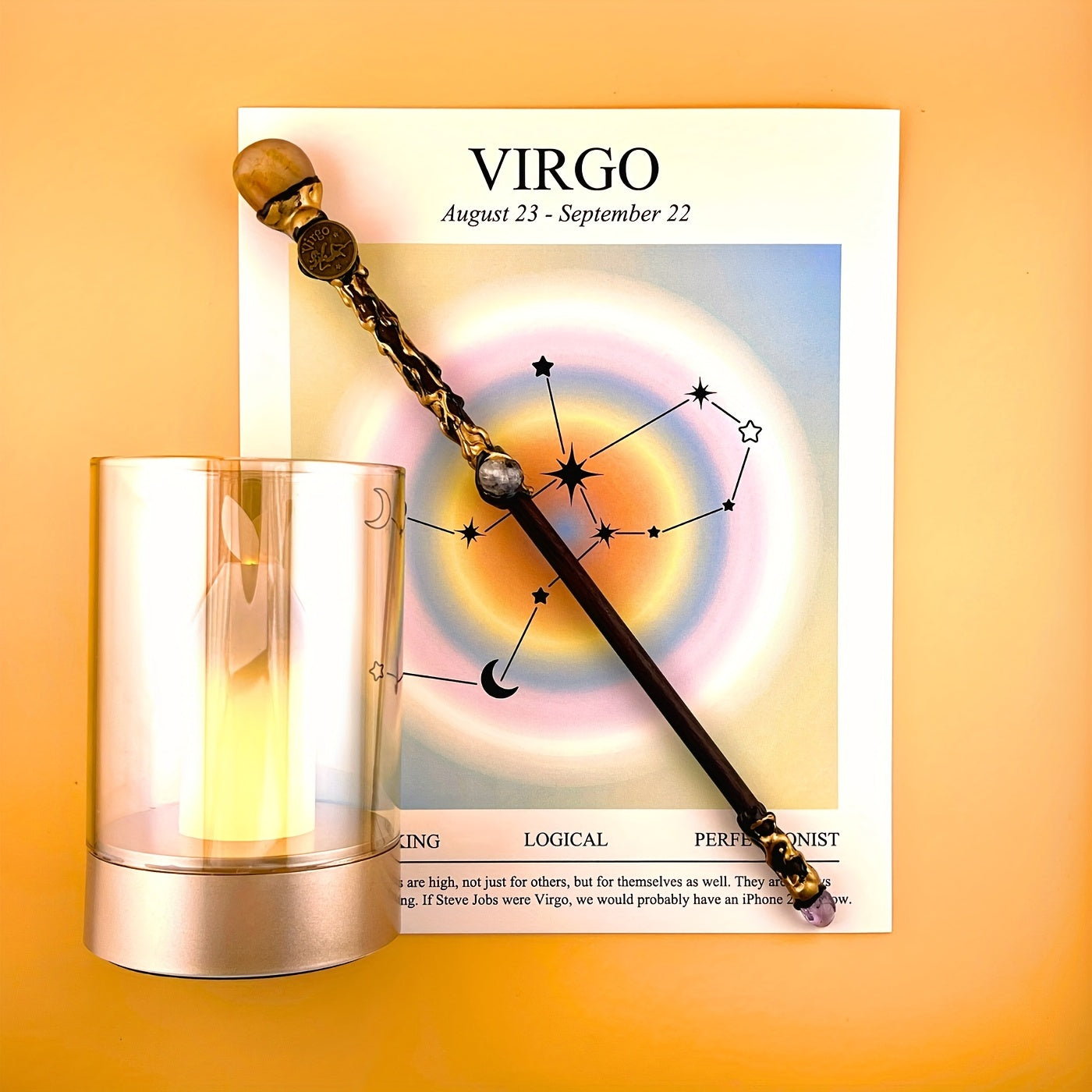 Virgo zodiac art print with constellation design displayed beside a glass candle holder and decorative astrology wand on a warm yellow background