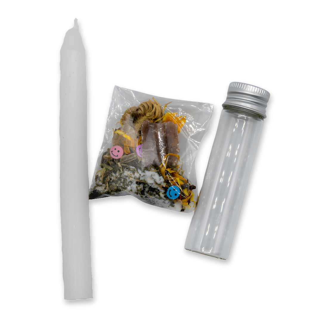White candle, bag of incense, and clear tube with silver cap on a white background