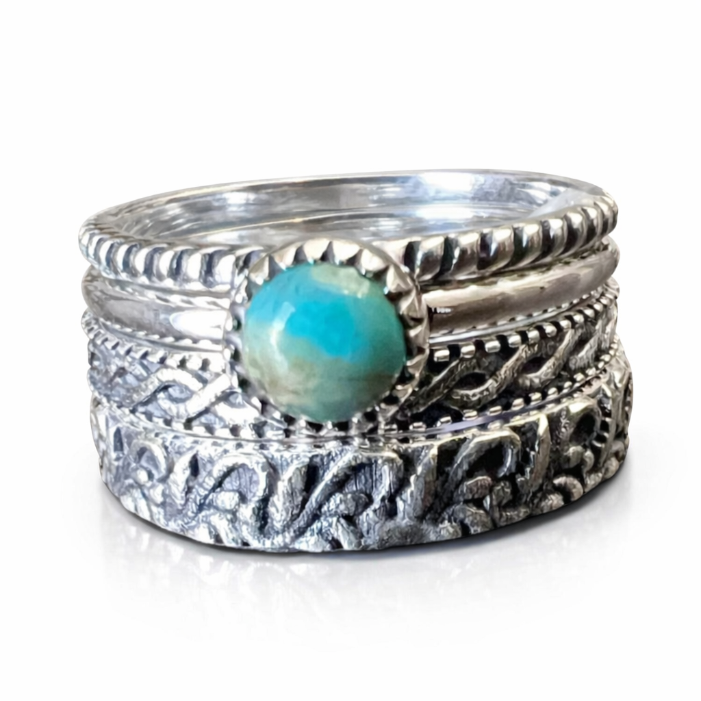 Sterling Silver stacker ring with turquoise stone on a white background
