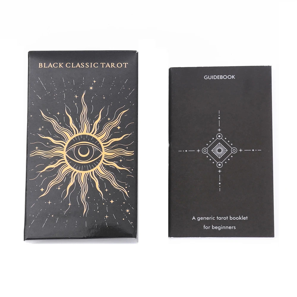 Black Classic Tarot packaging with sun design and guidebook on a white background