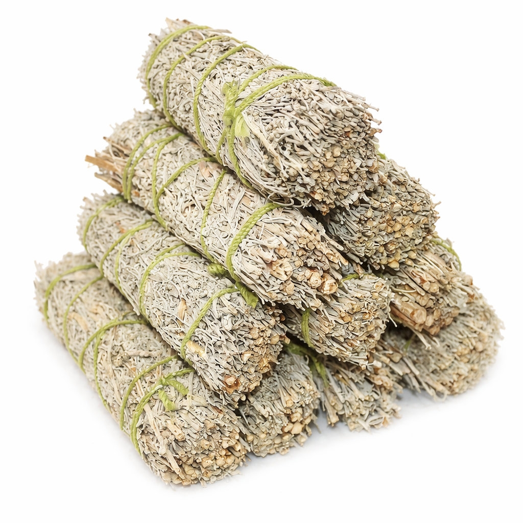 Stack of tied sage smudge sticks on a white background - Clover's Charm