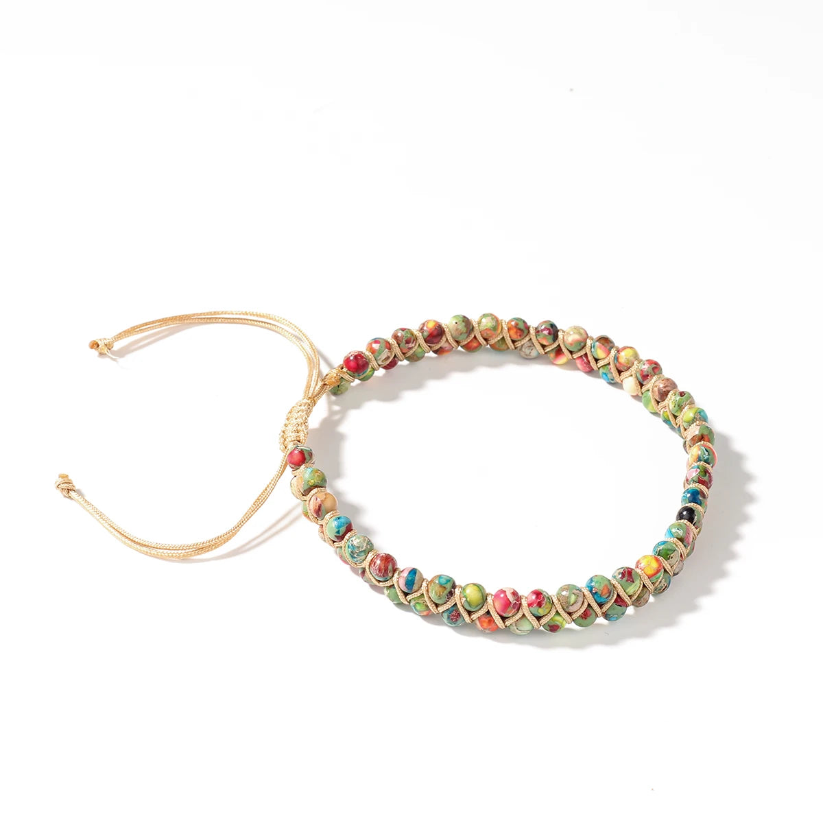 Colorful adjustable beaded braceleton a white background