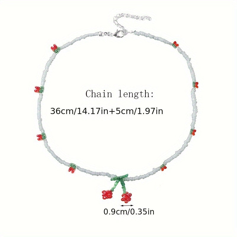 Necklace with floral cherry charms on a white background with measurements