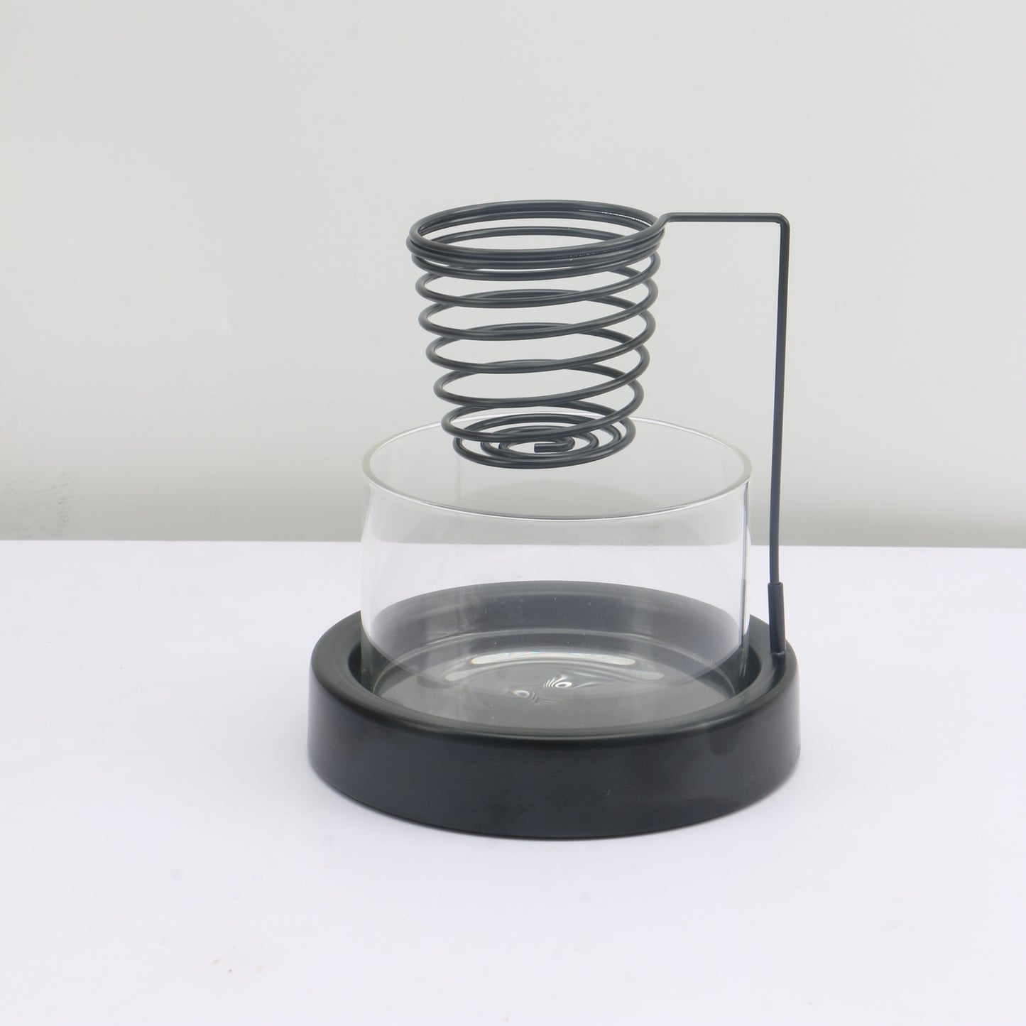 Minimal clear glass incense burner bowl with black metal base