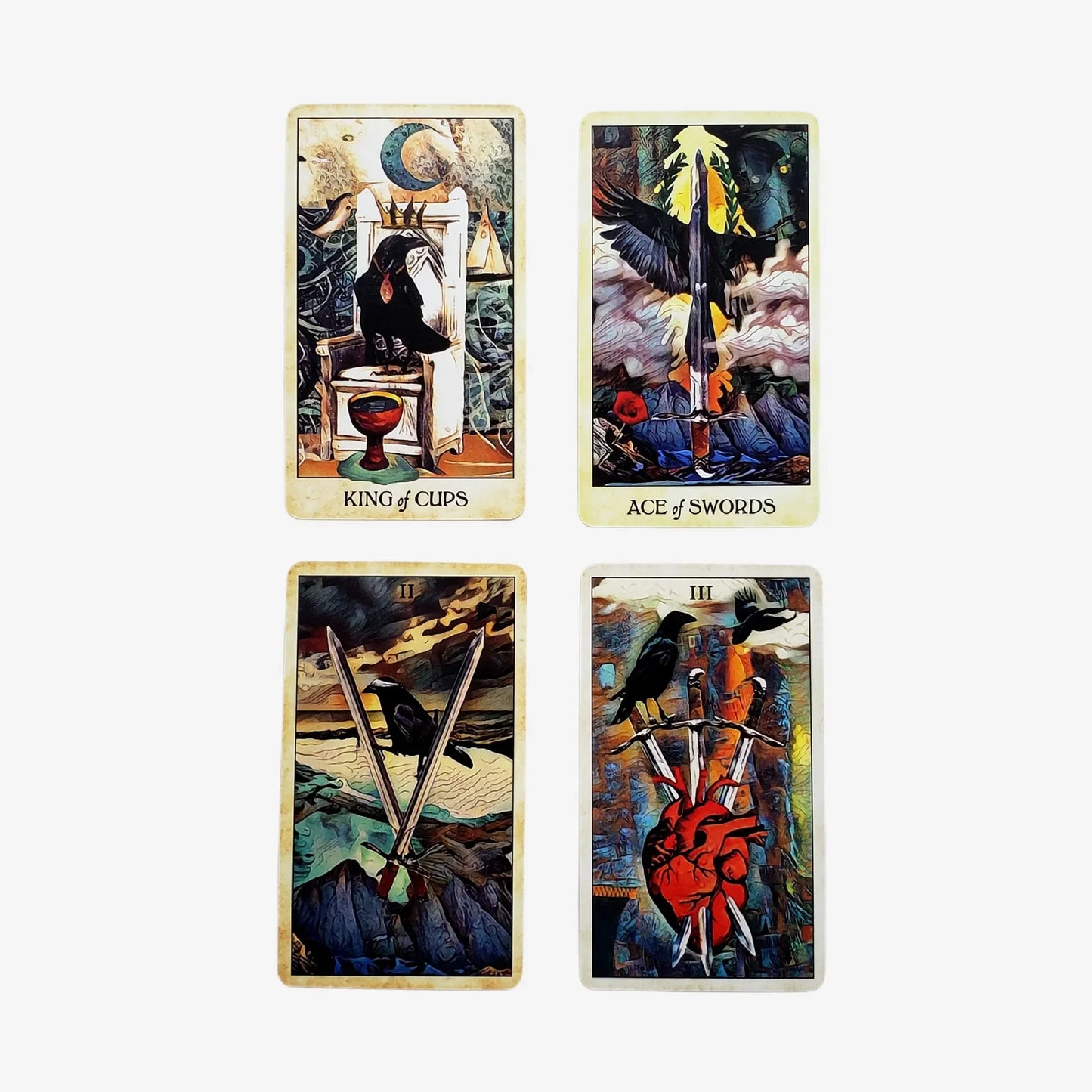 Four tarot cards with artistic designs on a white background