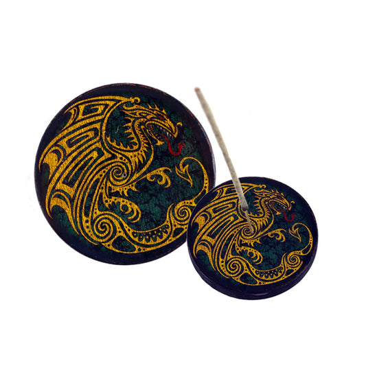Two round incense holders with dragon design on a white background
