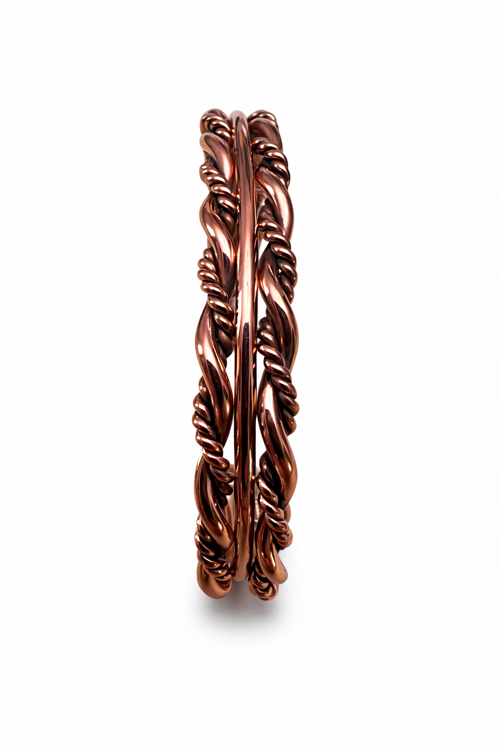 A top down view of an Elaine Tahe copper twist cuff bracelet with multi wire Navajo twist design on a white background.