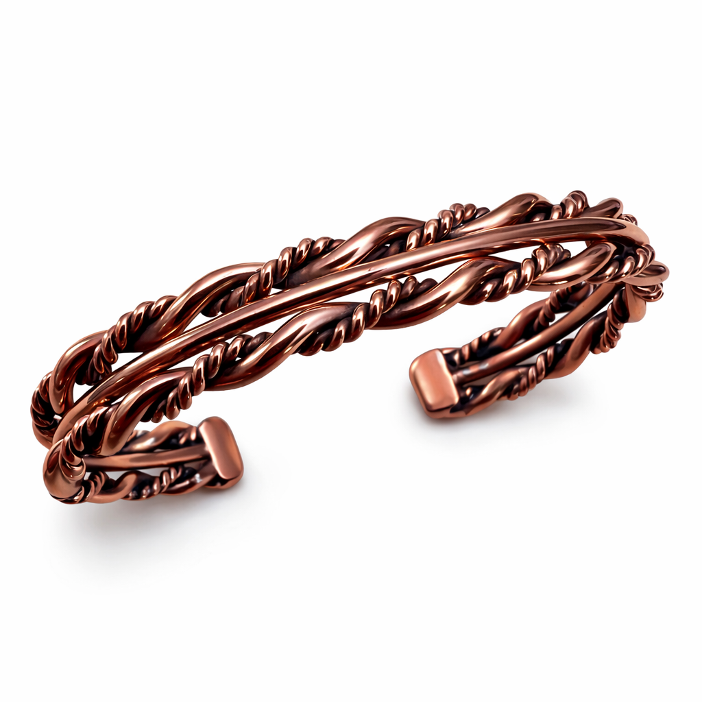 A closeup top down view of an Elaine Tahe copper twist cuff bracelet with multi wire Navajo twist design on a white background.