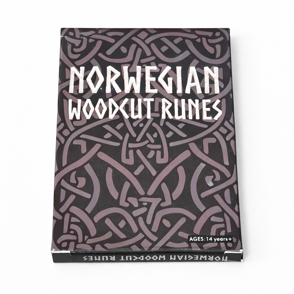Box of Norwegian Woodcut Runes with intricate patterns on a white background