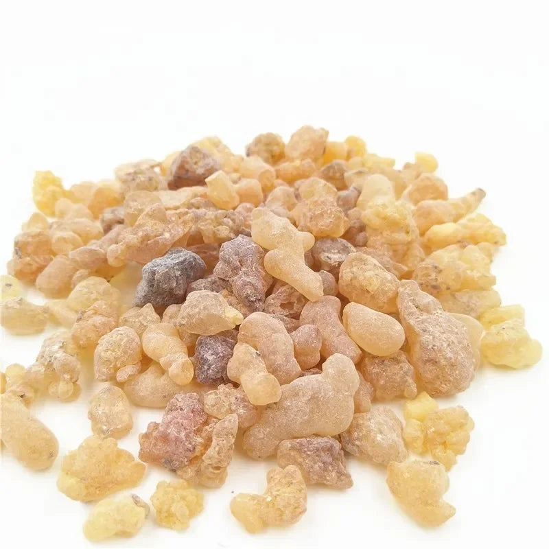 Heap of frankincense resin on a white background