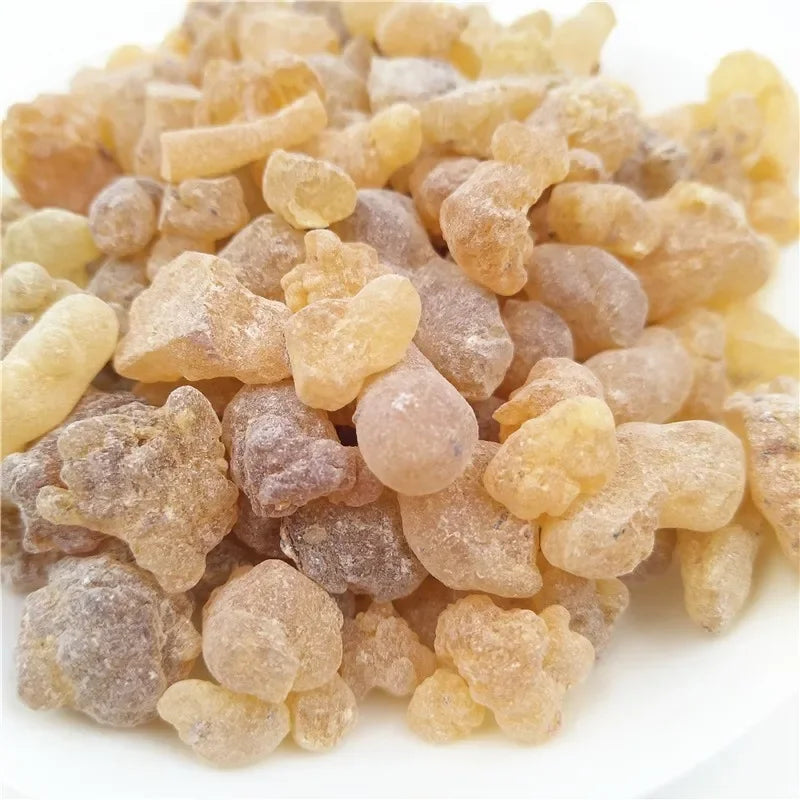 Close-up of a pile of resin stones on a white background