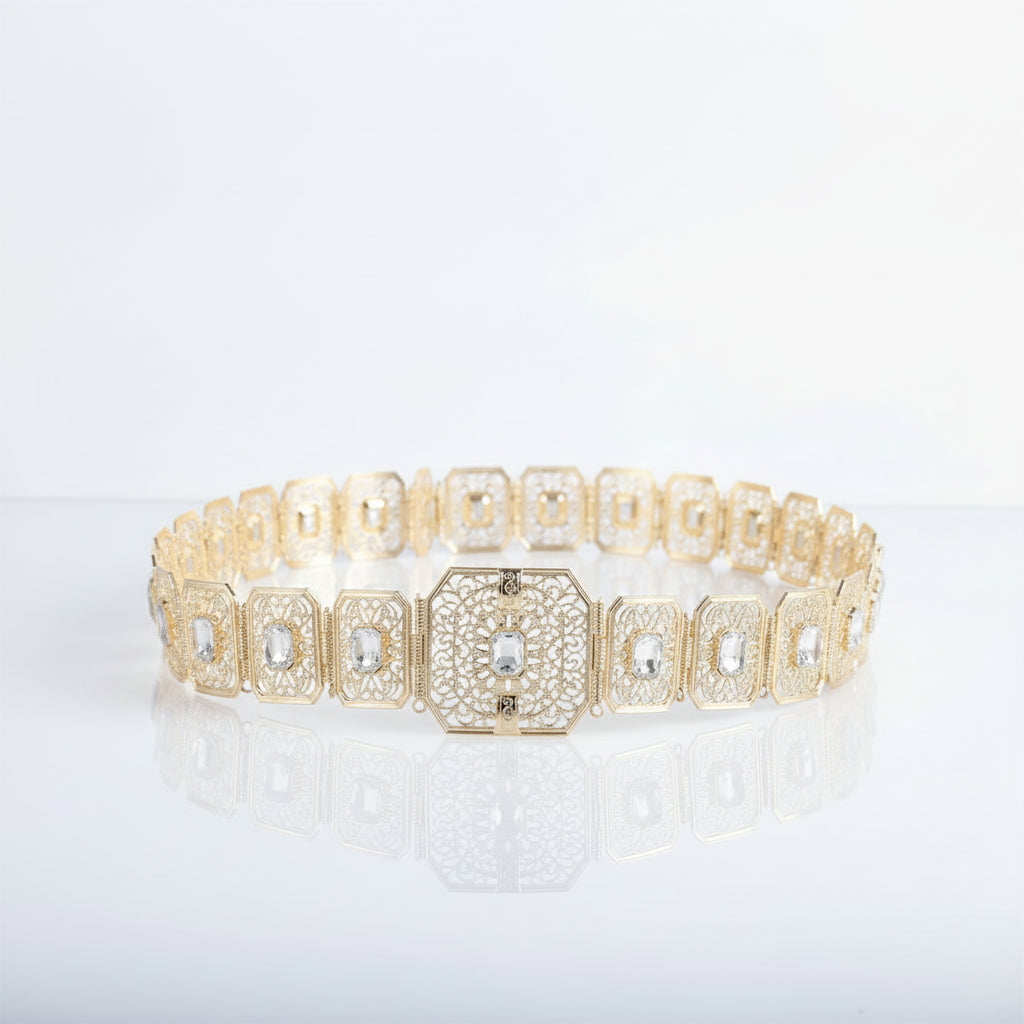 Gold bracelet with diamond accents on a white background