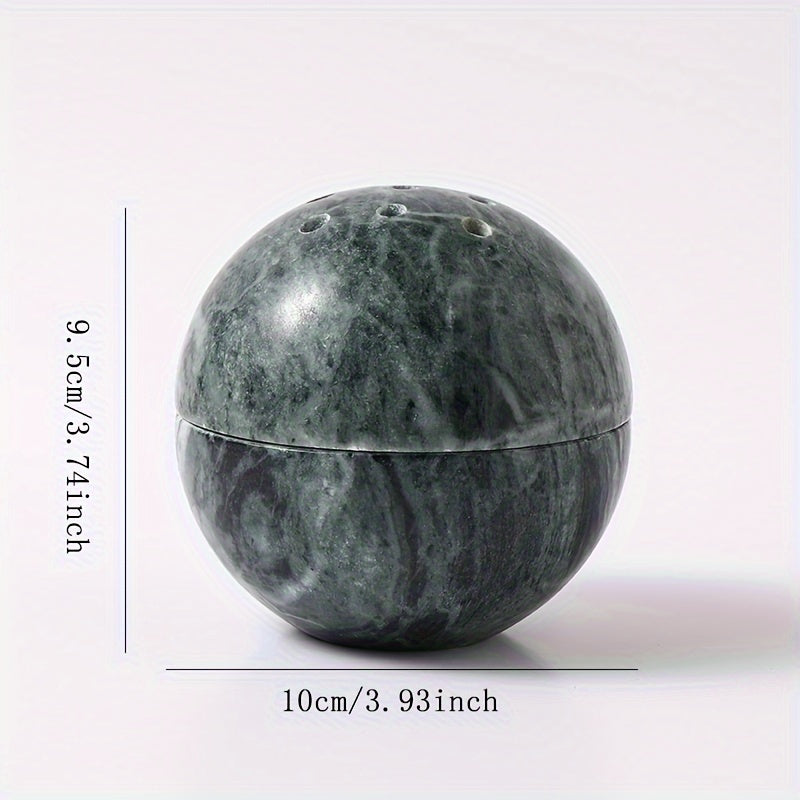Green marble sphere incense burner showing smooth handmade stone design and size
