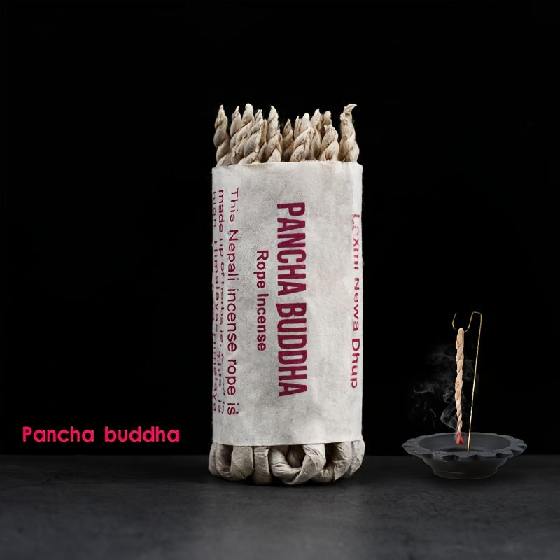 Kumari rope incense burning on incense holder with visible smoke