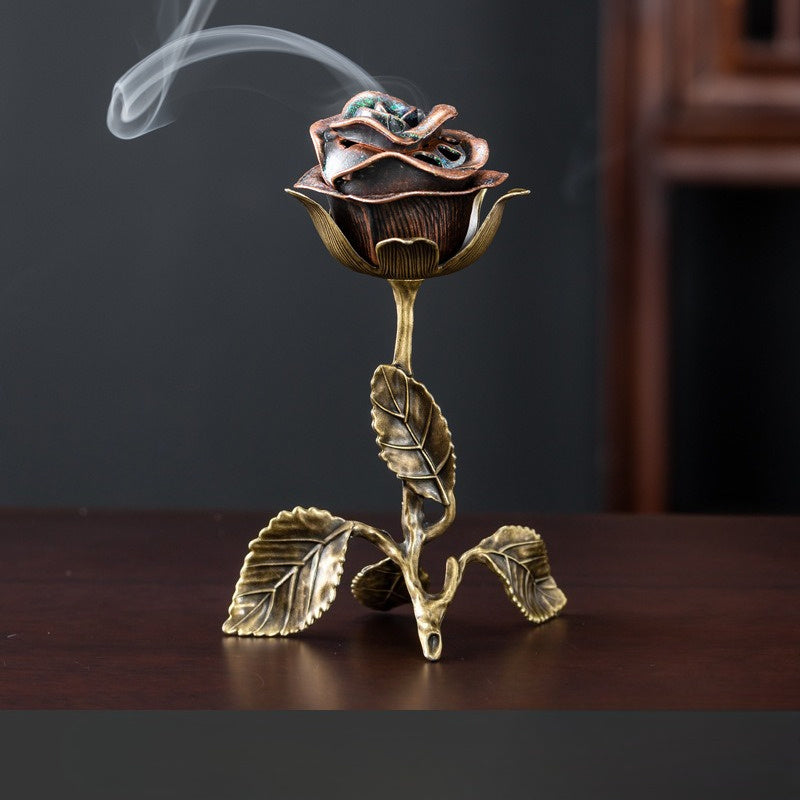 Bronze tone metal rose incense holder with sculpted leaves and stem
