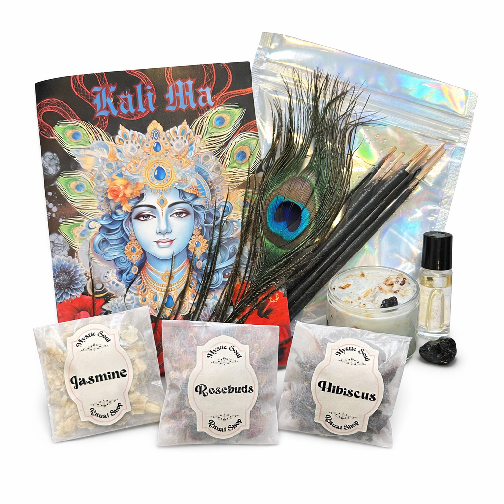 Kali Ma ritual kit with peacock feathers, a magazine, and small containers on a white background