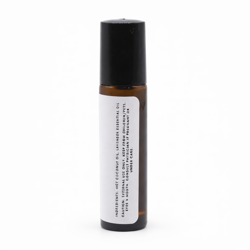 Lavender essential oil roll-on ingredients label featuring a small glass applicator bottle with a rollerball cap - Clover's Charm