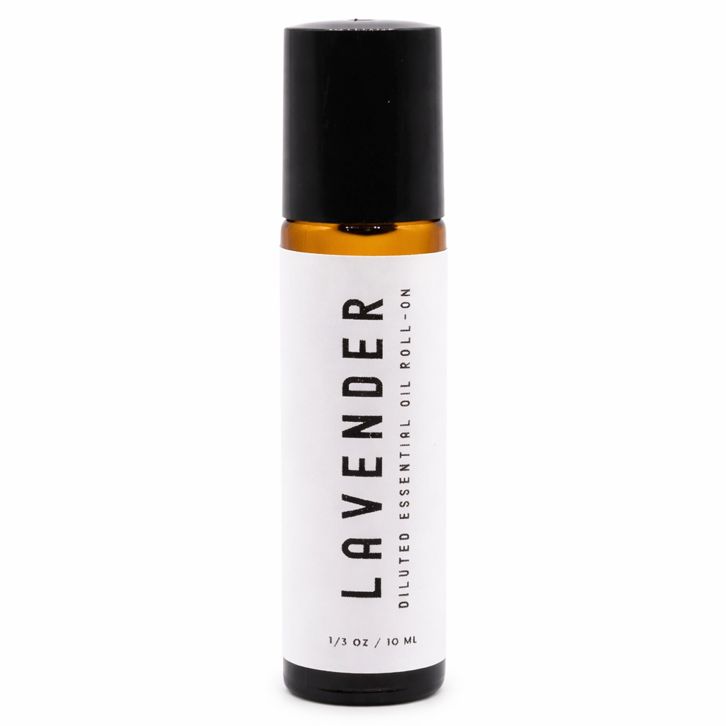 Lavender essential oil roll-on bottle on a white background - Clover's Charm