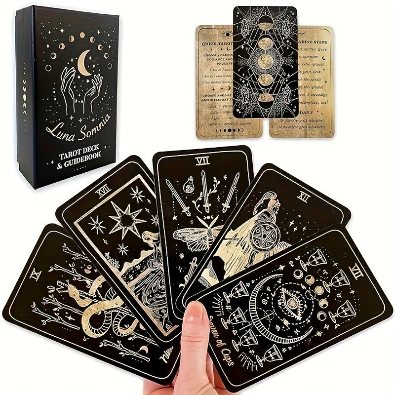 Luna Somnia tarot cards with packaging and a hand holding a card.