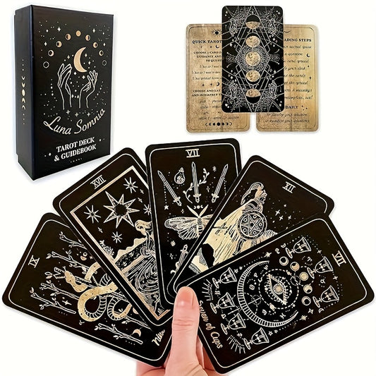 Luna Somnia tarot cards with packaging and a hand holding a card.